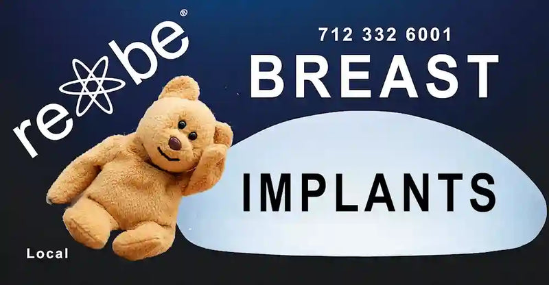billboard ad for breast implants with smiling teddy bear resting in an implant
